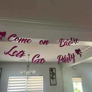 “Come on Barbie, Let’s Go Party” sparkly pink sign